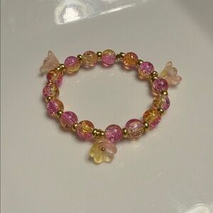 Pink and Gold Beaded Bracelet with Flower Accent Charms